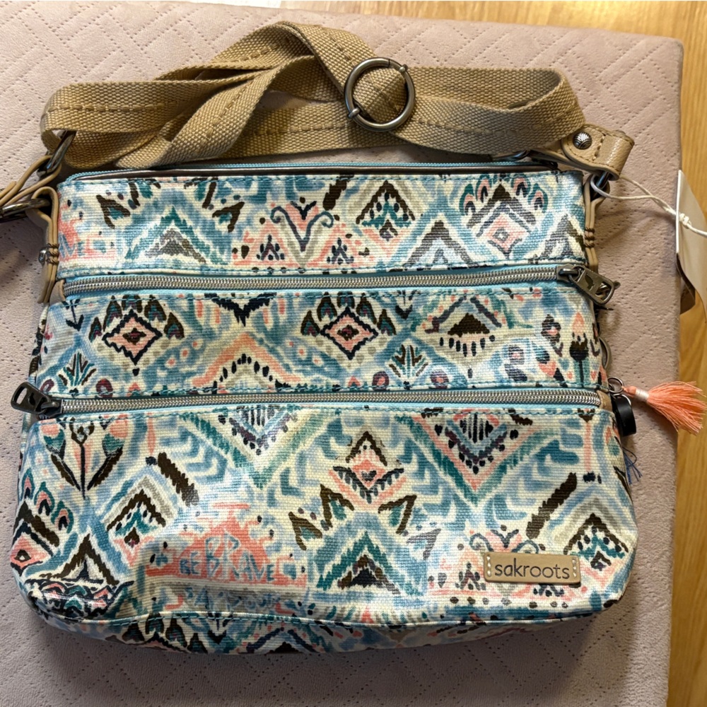 SakRoots geometric design white crossbody with blue brown & pink accents  - NWT